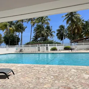 relaxing-beach-condo-5-mins-from-airport.comcaribbean.com/